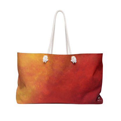 Front view of the Firelight Artful Ombre Weekend Bag with rope handle on white background.
