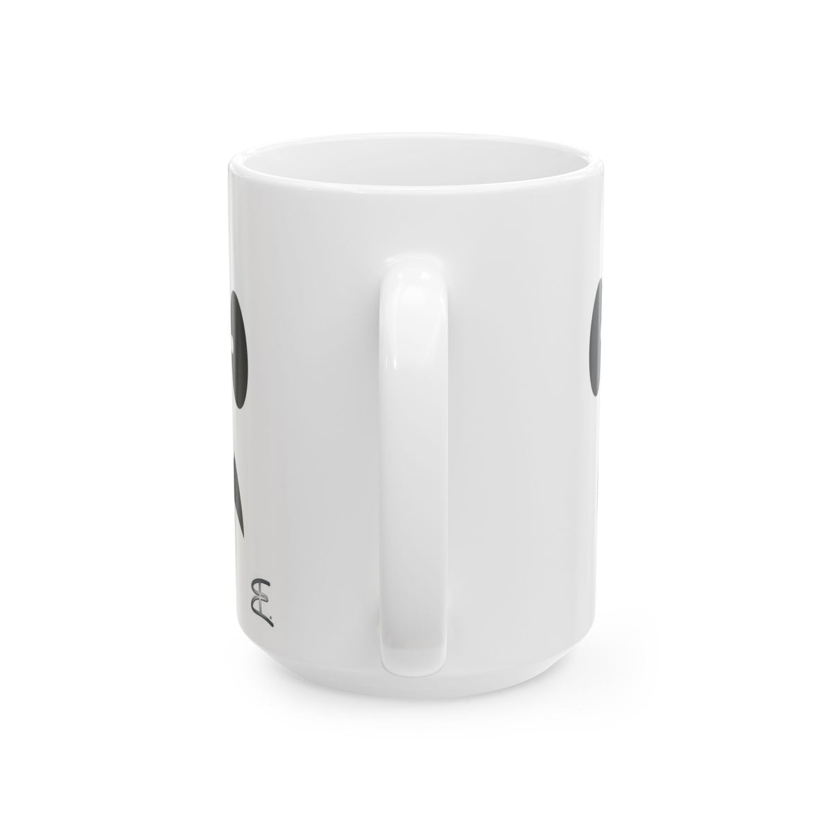A white ceramic mug with a handle, featuring partial black circular graphics and small black text near the bottom, shown against a plain white background.