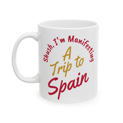 'Shush I'm Manifesting A Trip to Spain' Left handle view on white background.