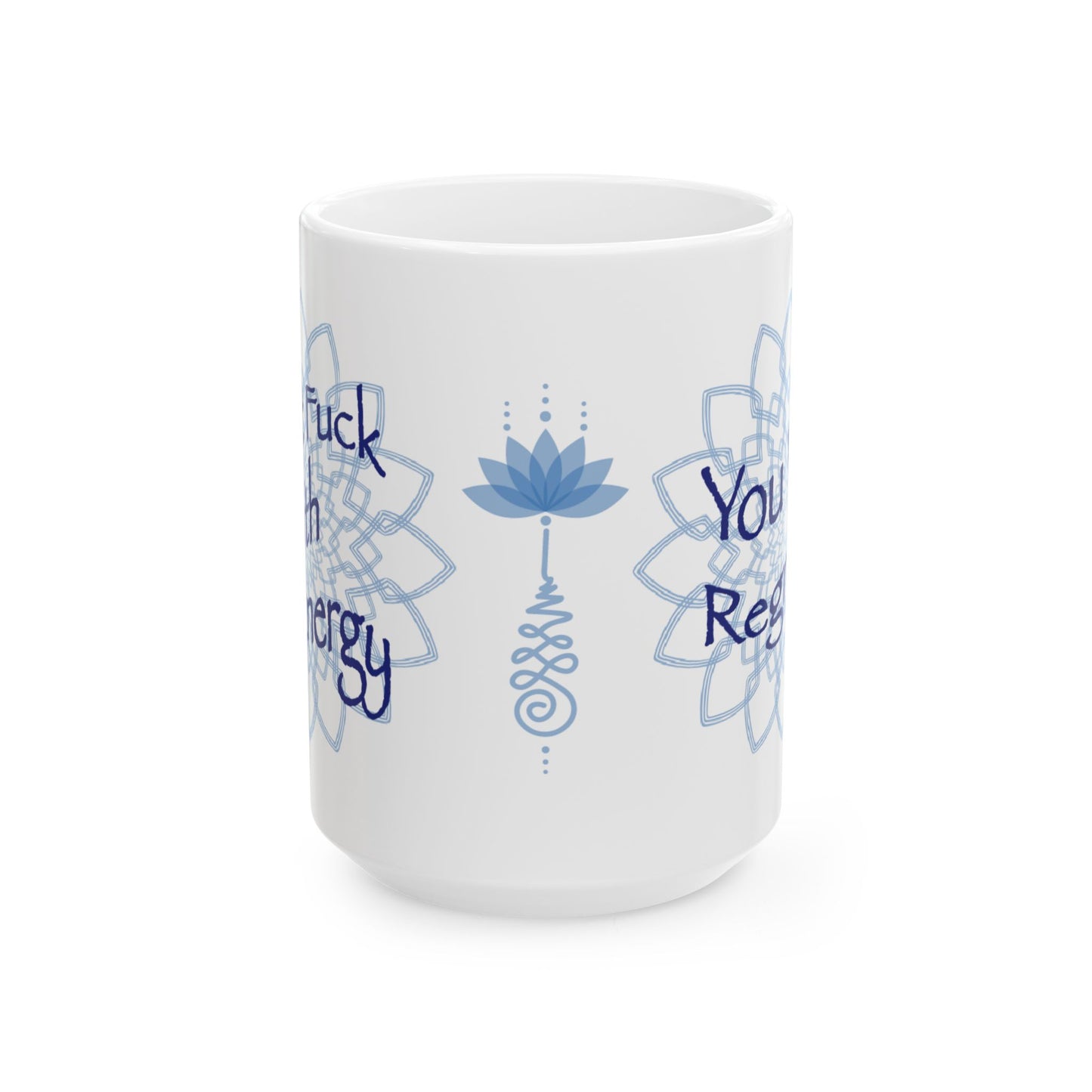 White ceramic mug with blue lotus flower and mandala artwork, showing partial text on both sides.