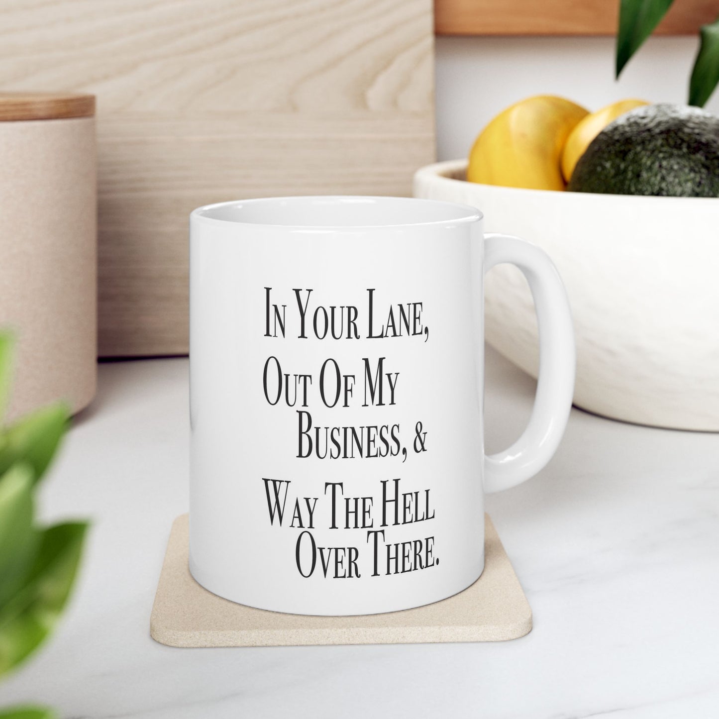 Double-sided sarcastic mug that says 'There are three places you can stay for free: in your lane, out of my business, and way the hell over there'


