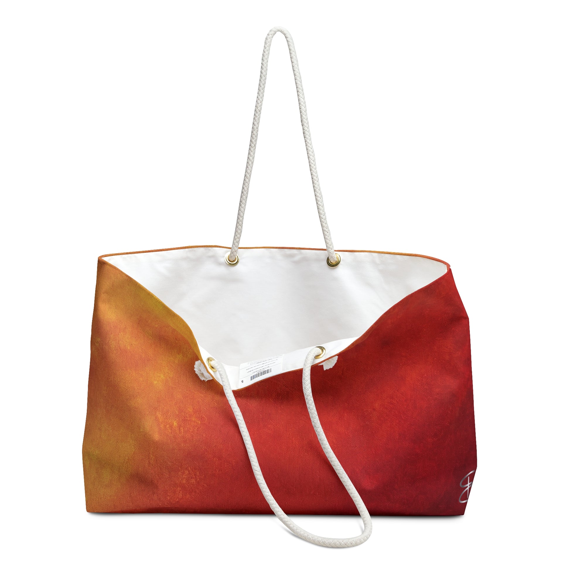 Front view of Firelight Artful Ombre Weekend Bag with rope handle, bag is open so that you can see the liner.