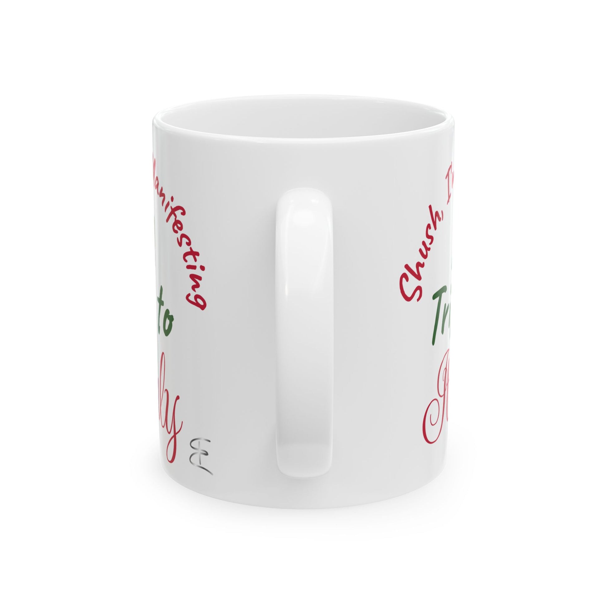 White mug with red and green text on a white background