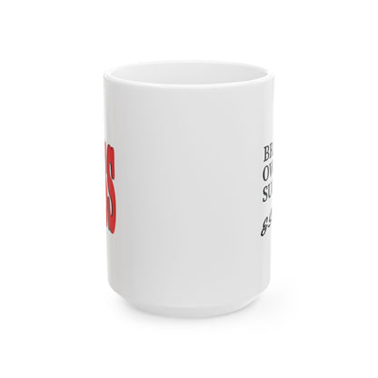 A white ceramic mug with partial red and black printed text visible on the side, shown against a plain white background.