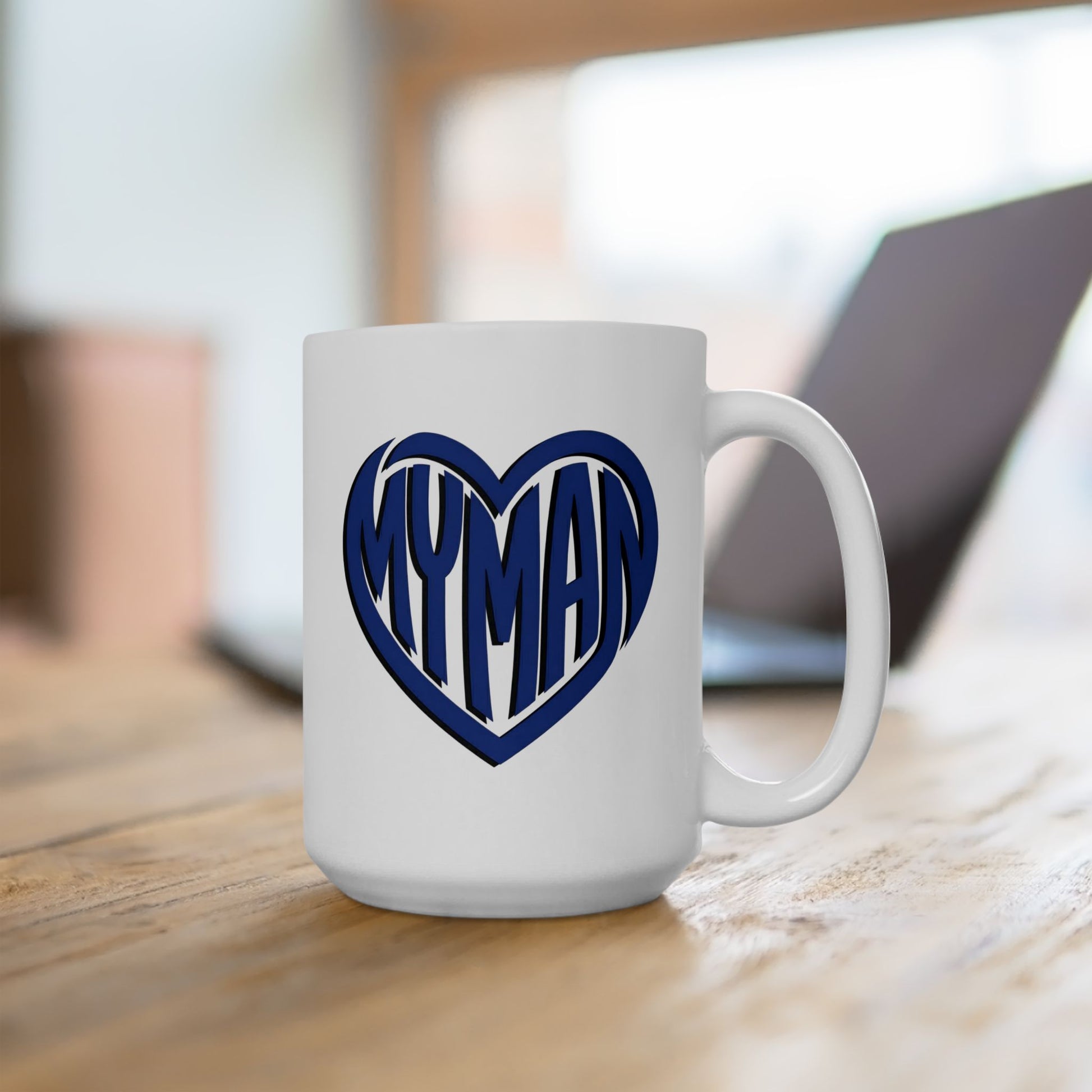 White mug with "My Man" text inside a heart.

