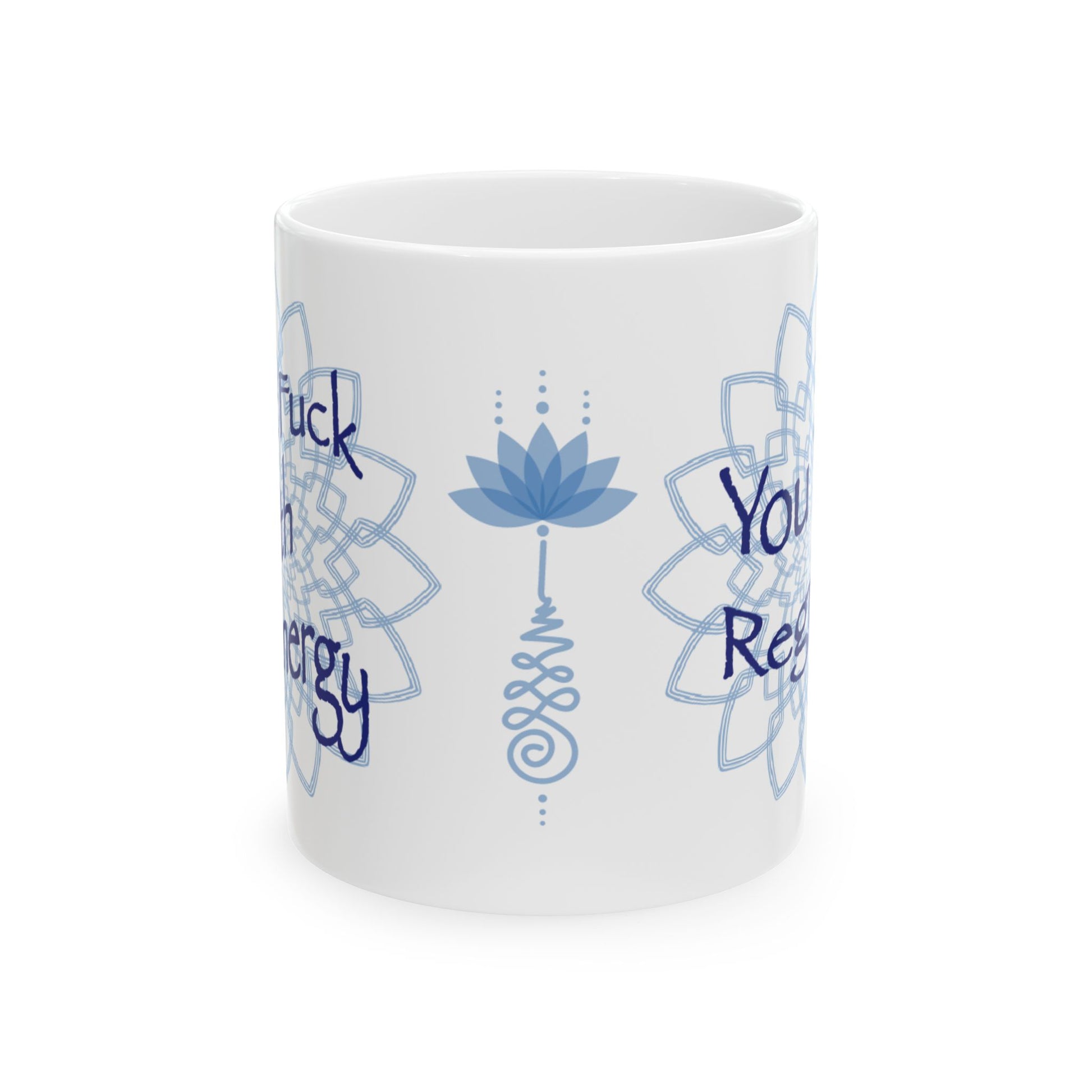 White ceramic mug featuring a blue lotus flower, mandala artwork, and partial text wrapping around the sides.