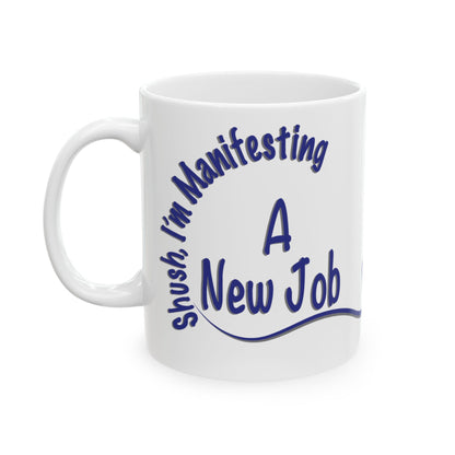 'Shush, I’m Manifesting A New Job' — ceramic mug front view handle on left on white background