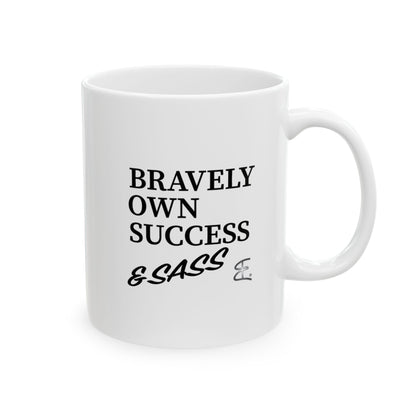 A white ceramic BOSS mug with black printed text reading 'BRAVELY OWN SUCCESS & SASS' on a clean white background.