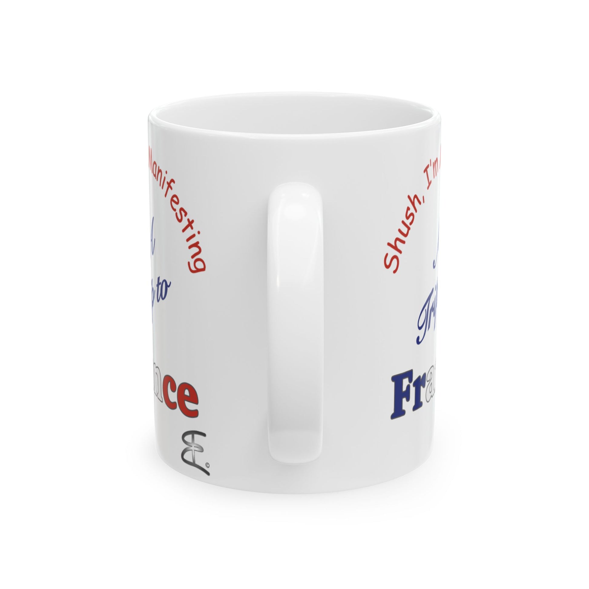 A white ceramic coffee mug back or handle view, featuring partial red and blue printed text on a clean white background.