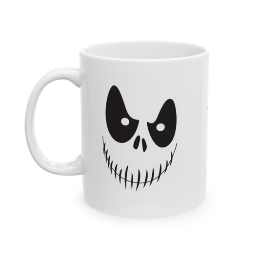 A white ceramic mug featuring a black graphic of a spooky cartoon face with large eyes and a stitched grin, shown on a plain white background.