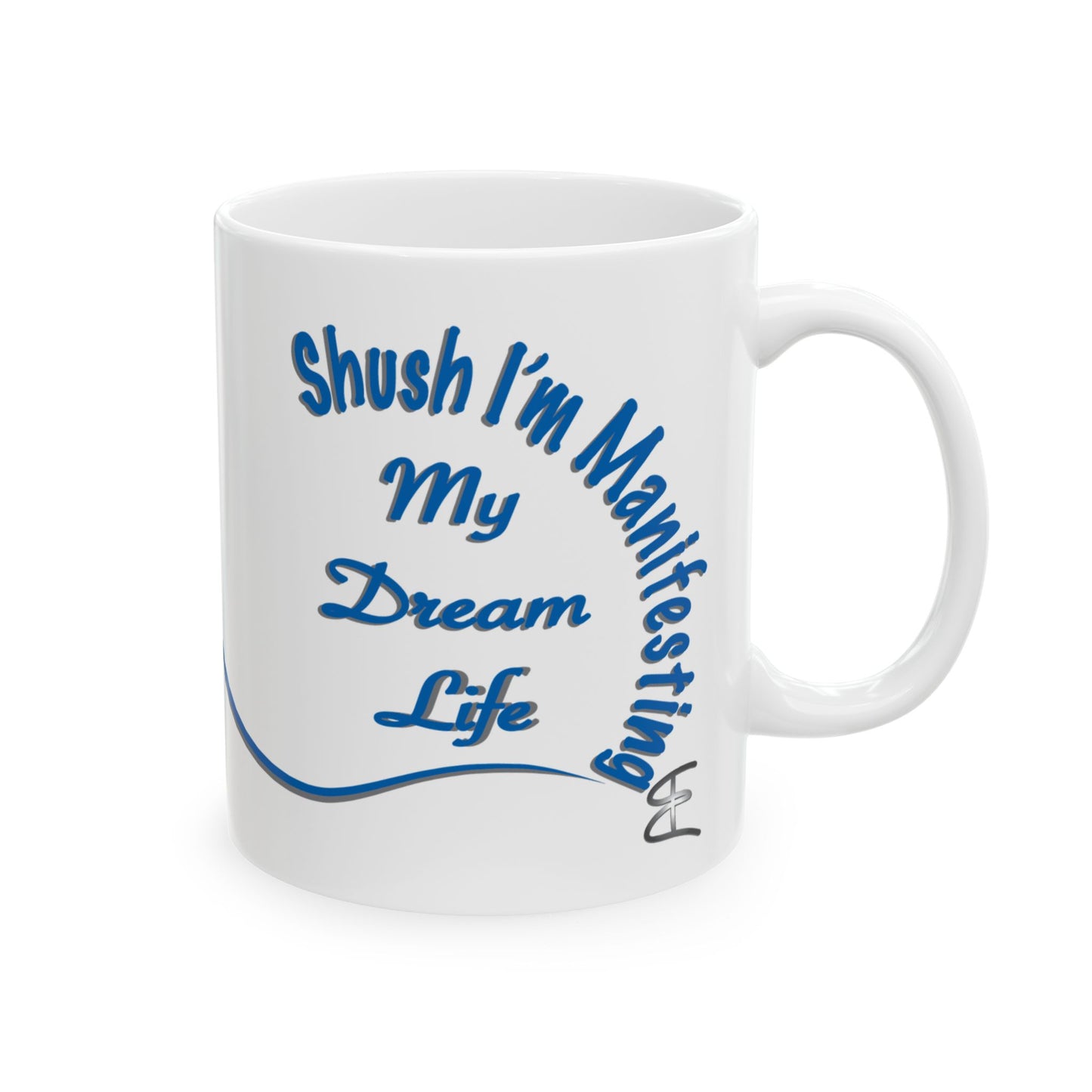 White ceramic mug with the text 'Shush, I'm Manifesting My Dream Life'

