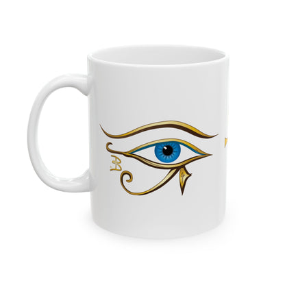 A white ceramic 11oz mug featuring a stylized gold Eye of Horus graphic with a blue iris on the front, set against a plain white background.