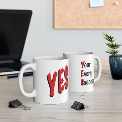 White ceramic YES mug displaying both sides with bold red "YES" on one side and "Yes, You're Every Success" on the other.