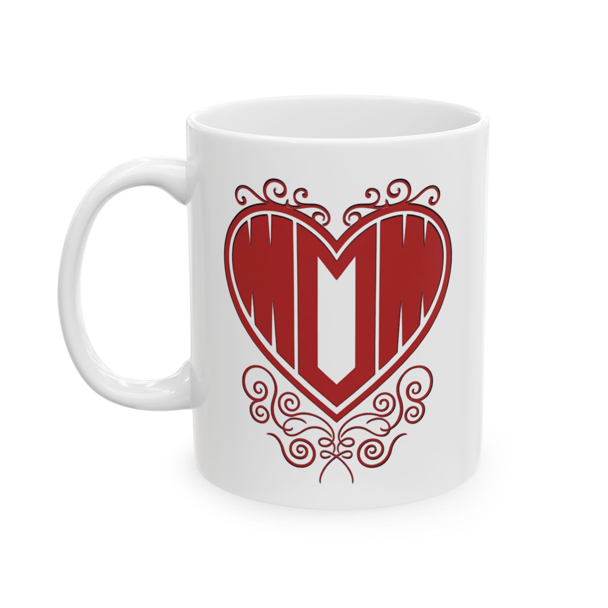 White ceramic mug with "Mom" printed in red text inside a heart with decorative filigree, on a white background.