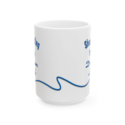 White ceramic mug with the text 'Shush, I'm Manifesting My Dream Life'

