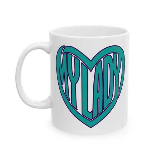 A white ceramic mug featuring a heart-shaped graphic with the word 'MY LADY' in stylized teal and purple lettering, set against a plain white background.