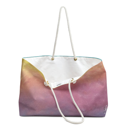 Front view of Artful Ombre Sunrise Weekend Bag with rope handle, bag is open so that you can see the liner.