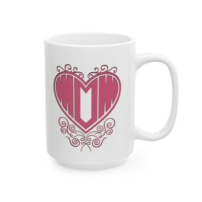 15oz front view of white ceramic mug featuring "Mom" printed in pink text inside a heart with filigree, on white background.