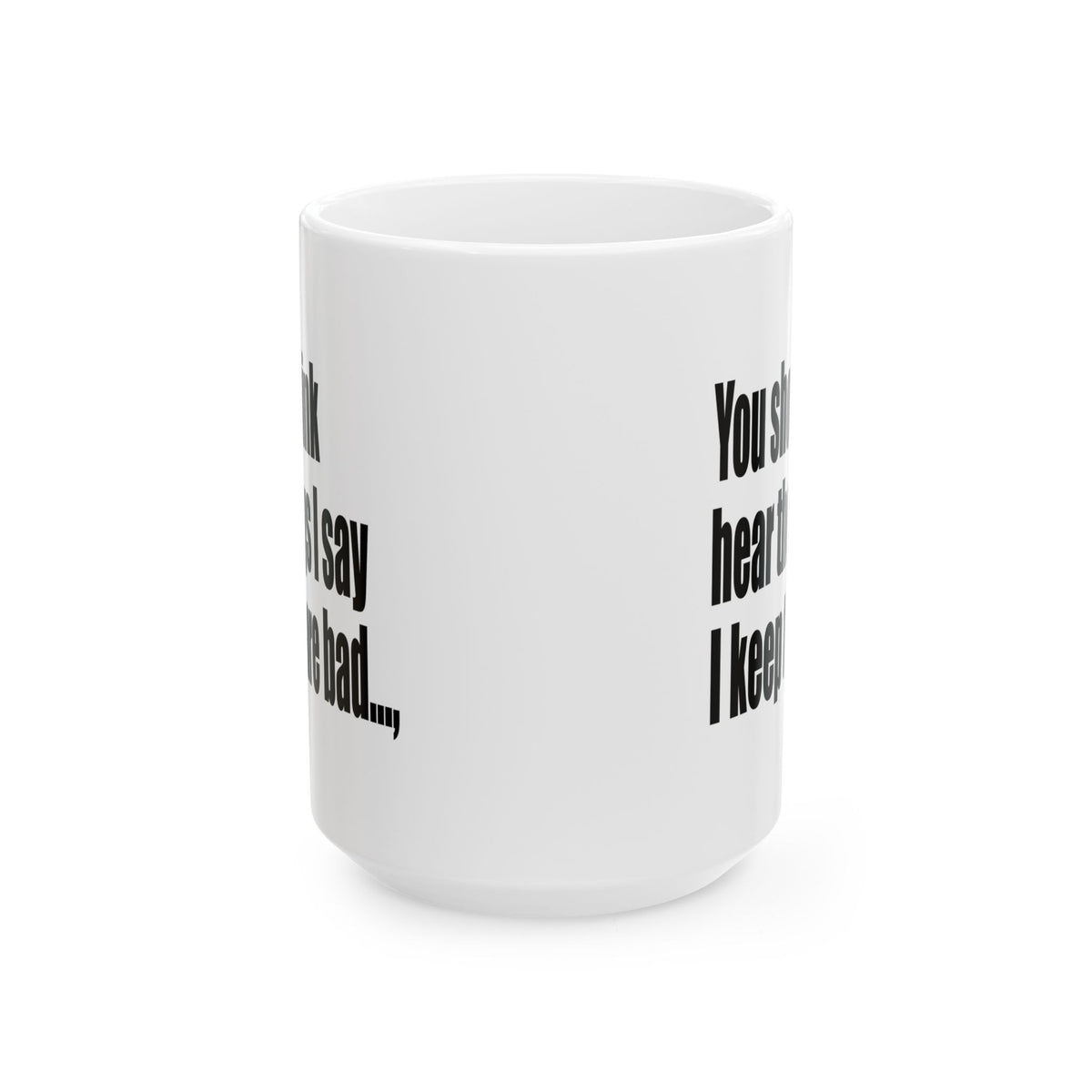 A white ceramic mug with black printed text on a clean white background.