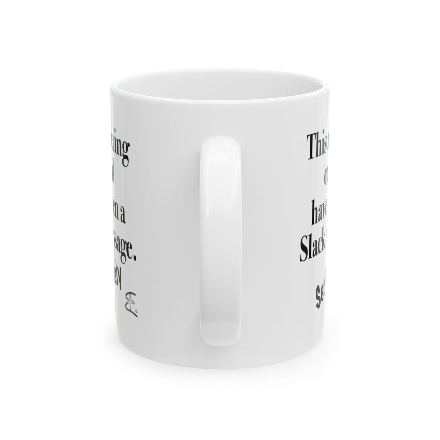 This white ceramic mug says "This Meeting Could Have Been A Slack Message" back view of handle with text visible on sides.