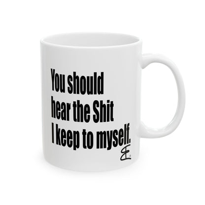A white ceramic mug with bold black text that reads 'You should hear the Shit I keep to myself.' shown on a plain white background.