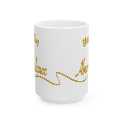 A white ceramic mug with gold cursive text wrapping around the side, shown on a clean white background.