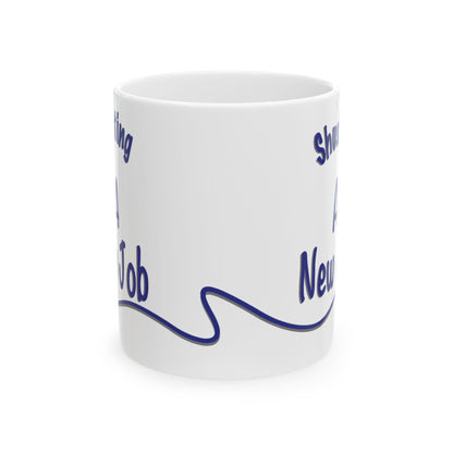 'Shush, I’m Manifesting A New Job' — ceramic mug front angled view.