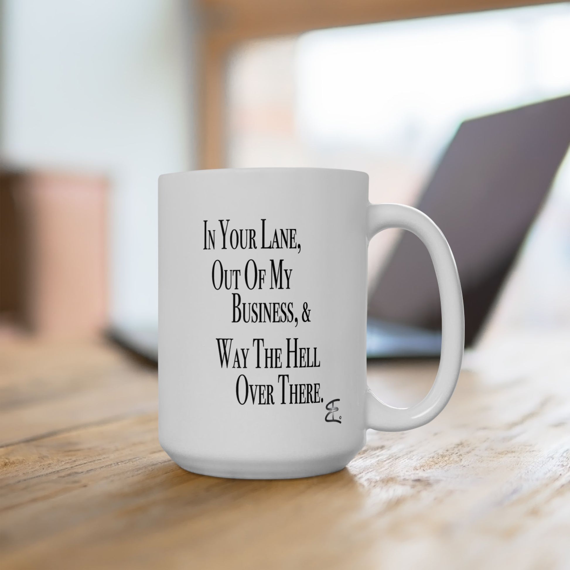 "Stay In Your Lane" mug on work desk with coffee, boundary setting energy for remote work and coworker gifts

