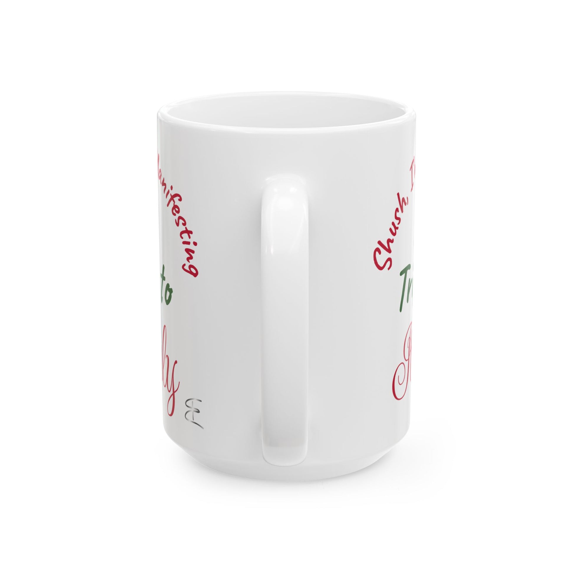 White mug with red and green text on a white background