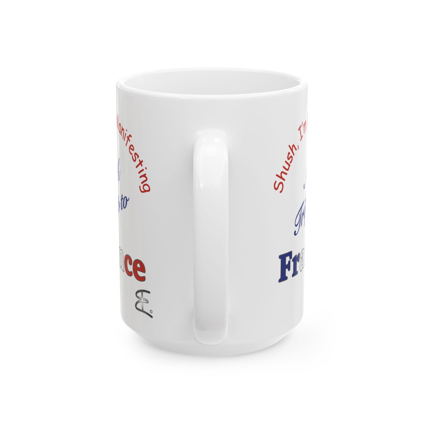 A white ceramic coffee mug with a handle, featuring printed red, white and blue text and symbols on a clean white background.