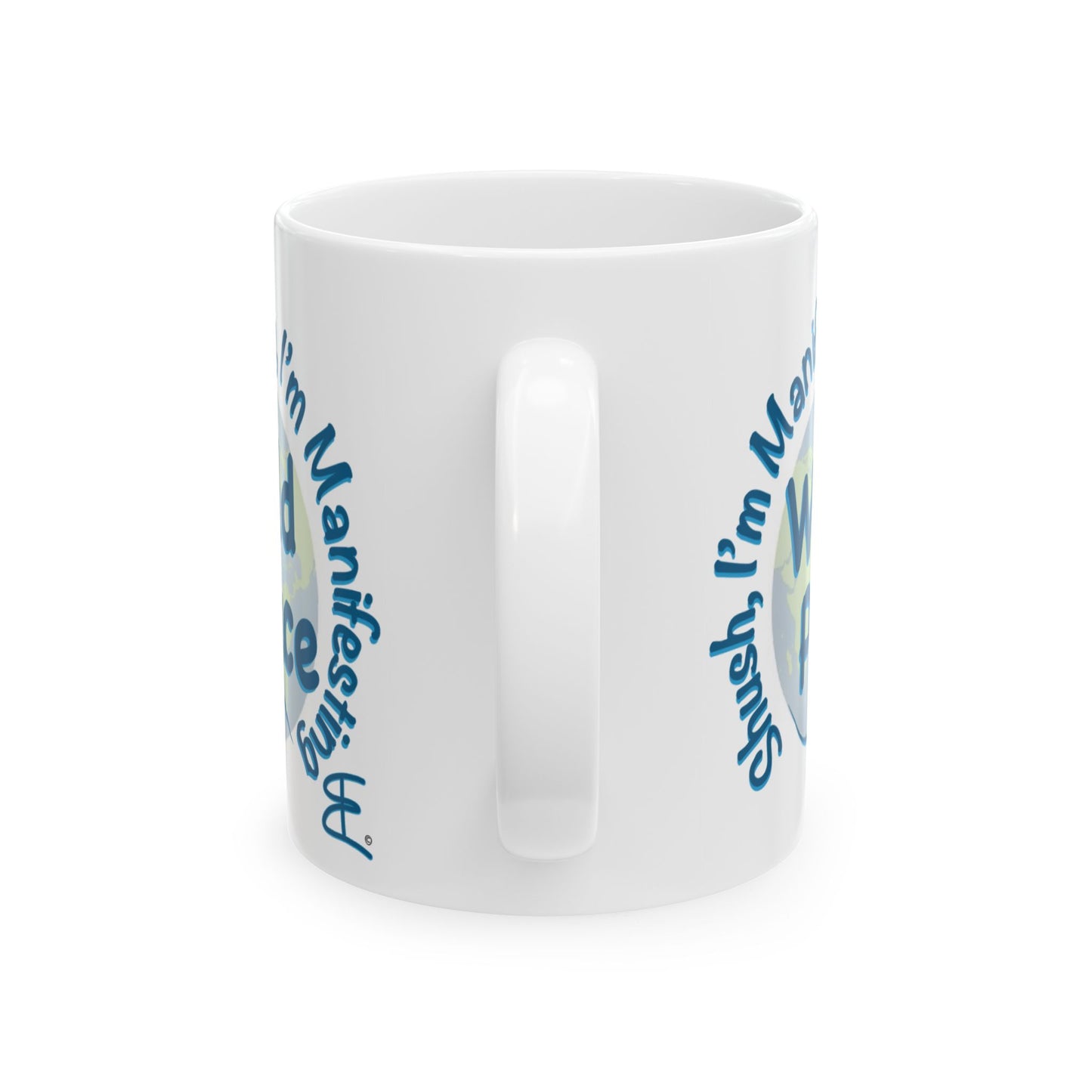 A white 10 oz ceramic mug with a blue, light blue and green graphic design that reads 'Shush I'm Manifesting World Peace' on a clean white background.