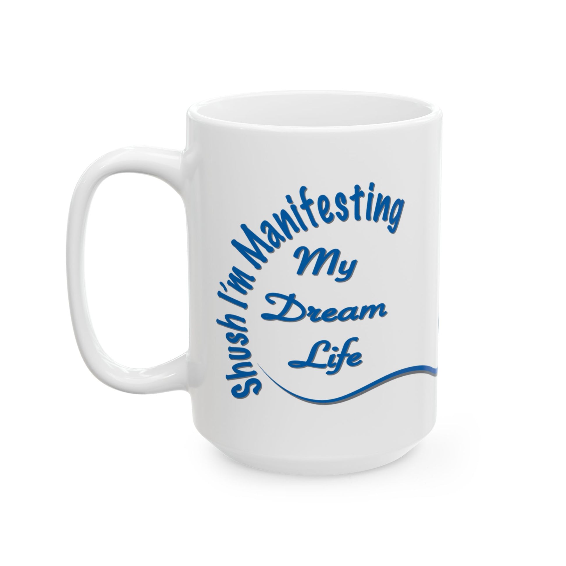 White ceramic mug with the text 'Shush, I'm Manifesting My Dream Life'

