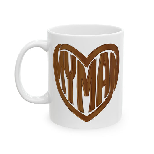 A white ceramic mug featuring a brown heart-shaped graphic with the word 'MYMAN' in stylized lettering, set against a plain white background.