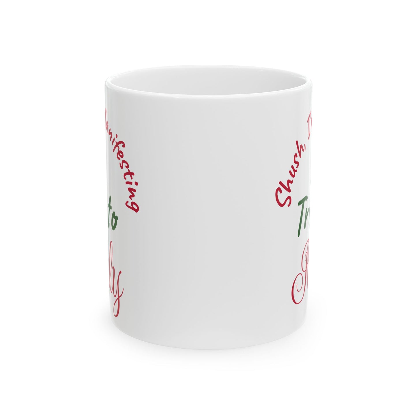 White mug with red and green text on a white background