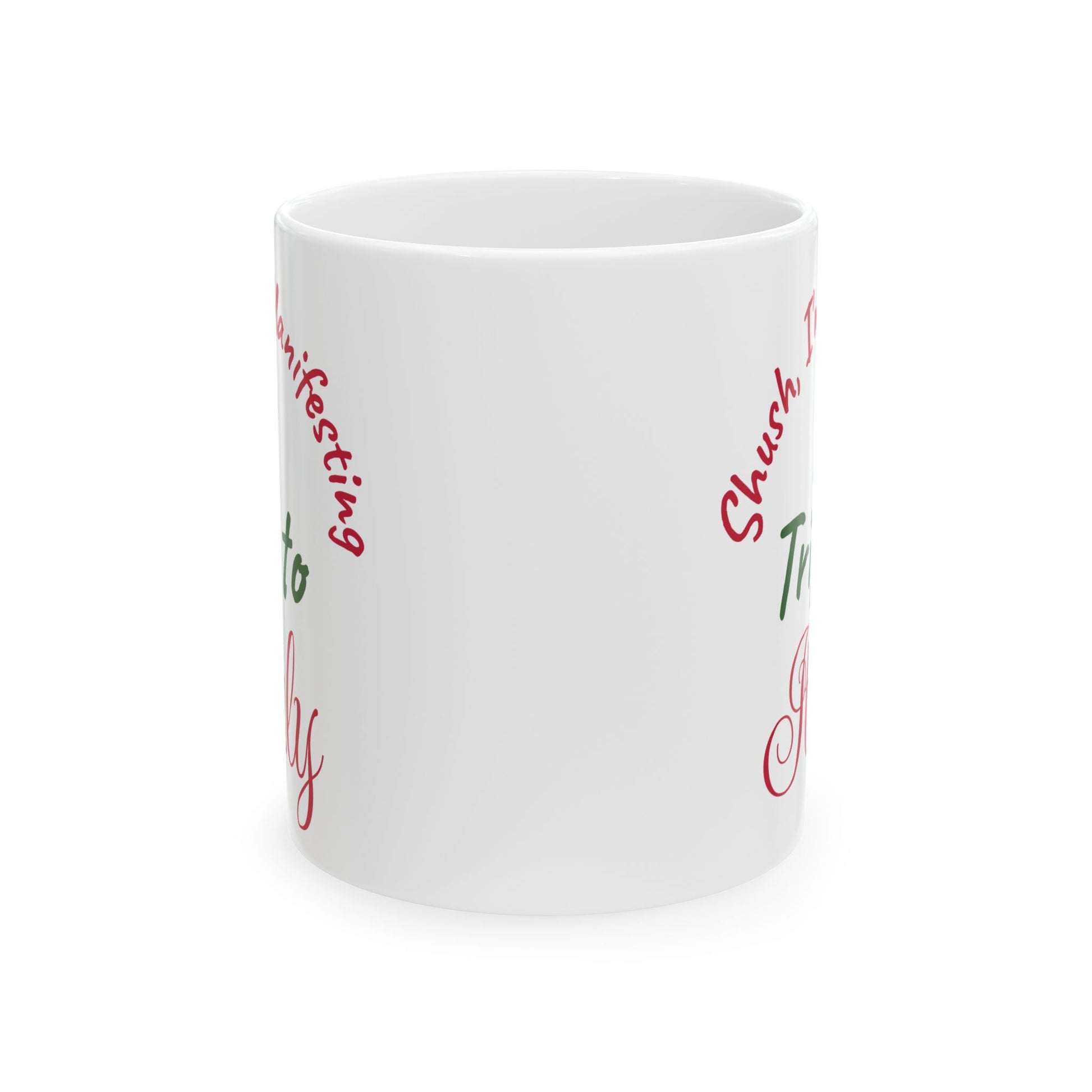White mug with red and green text on a white background