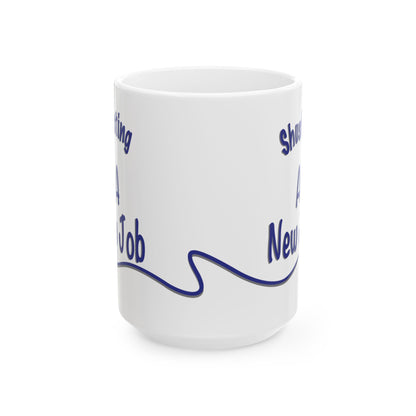 'Shush, I’m Manifesting A New Job' — 15oz ceramic mug back front angled view.